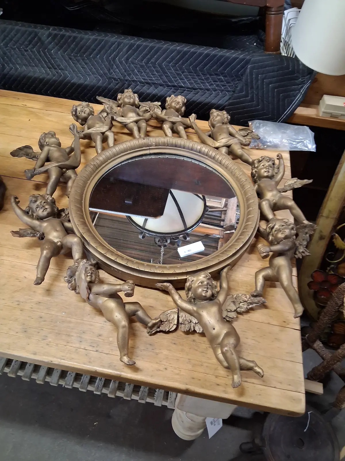 Round Italian Mirror Surrounded By Carved Cherubs 1