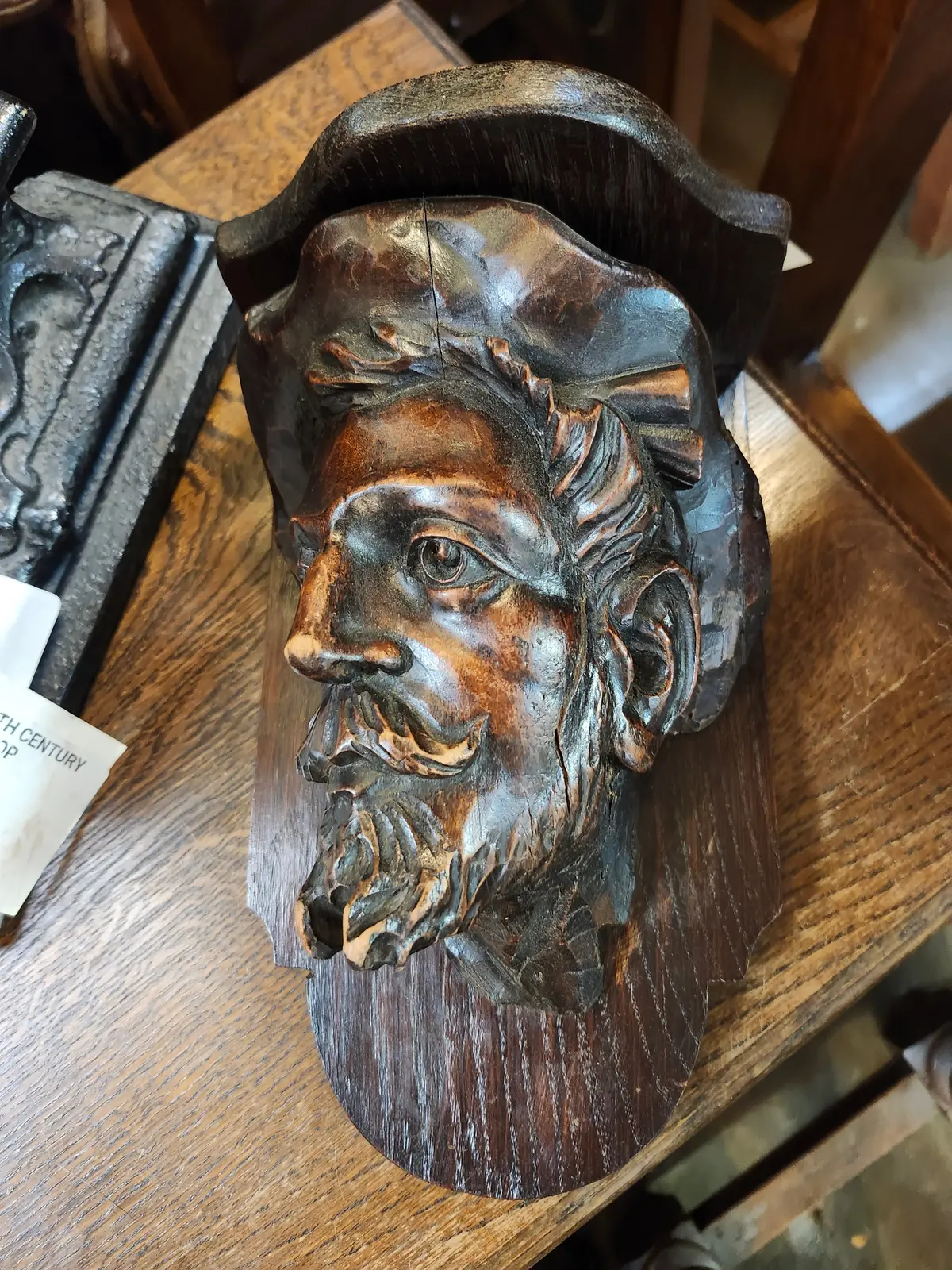 Carved Elm Shelf With Man's Head 1