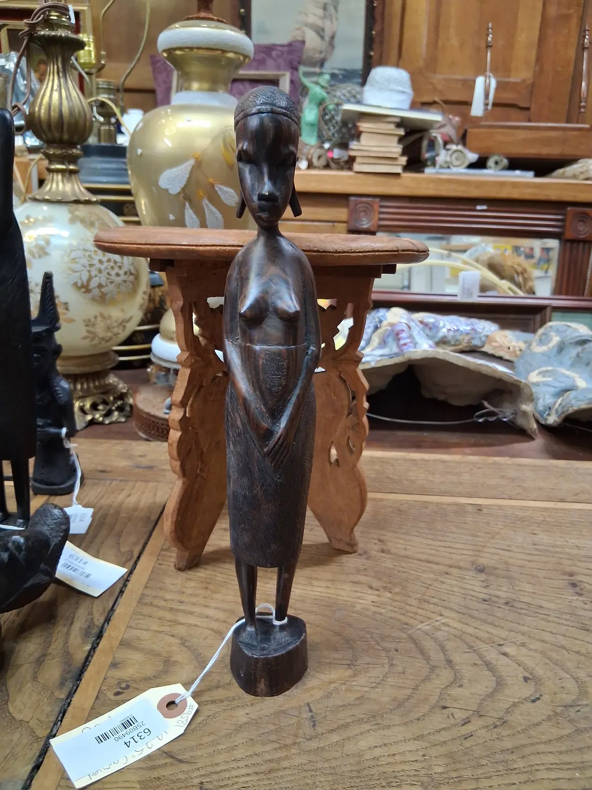 Carved Wood Woman With Rings In Ears Figure 1