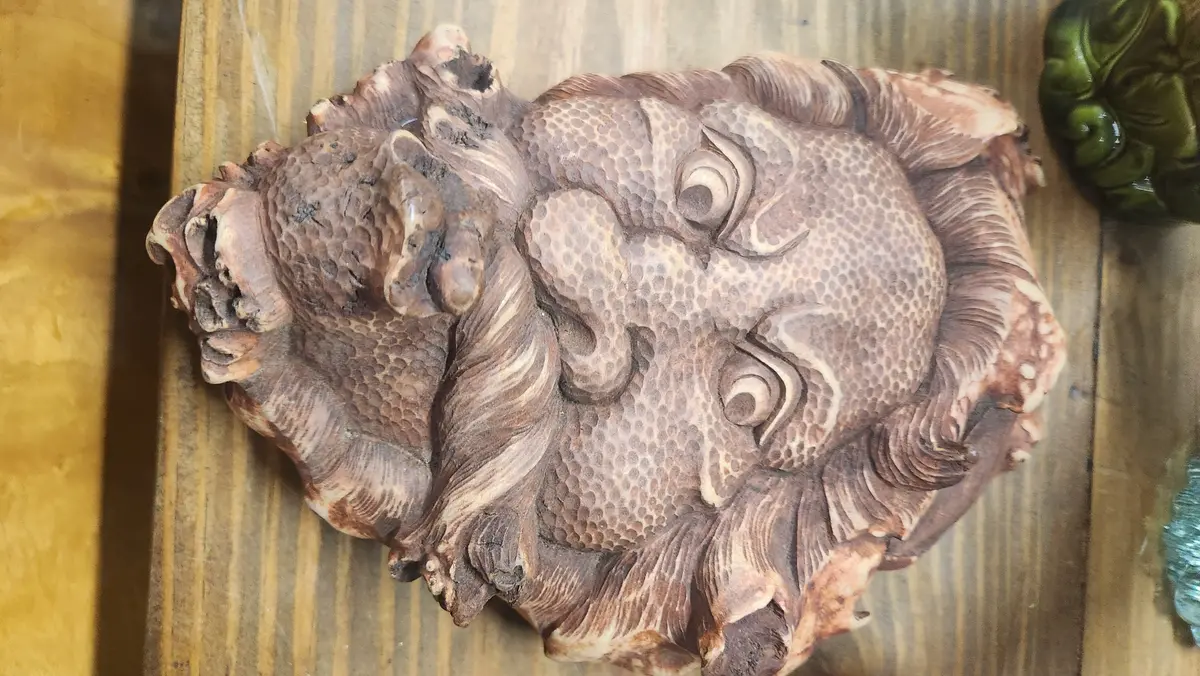 Rust Colored Carved Asian Man 1