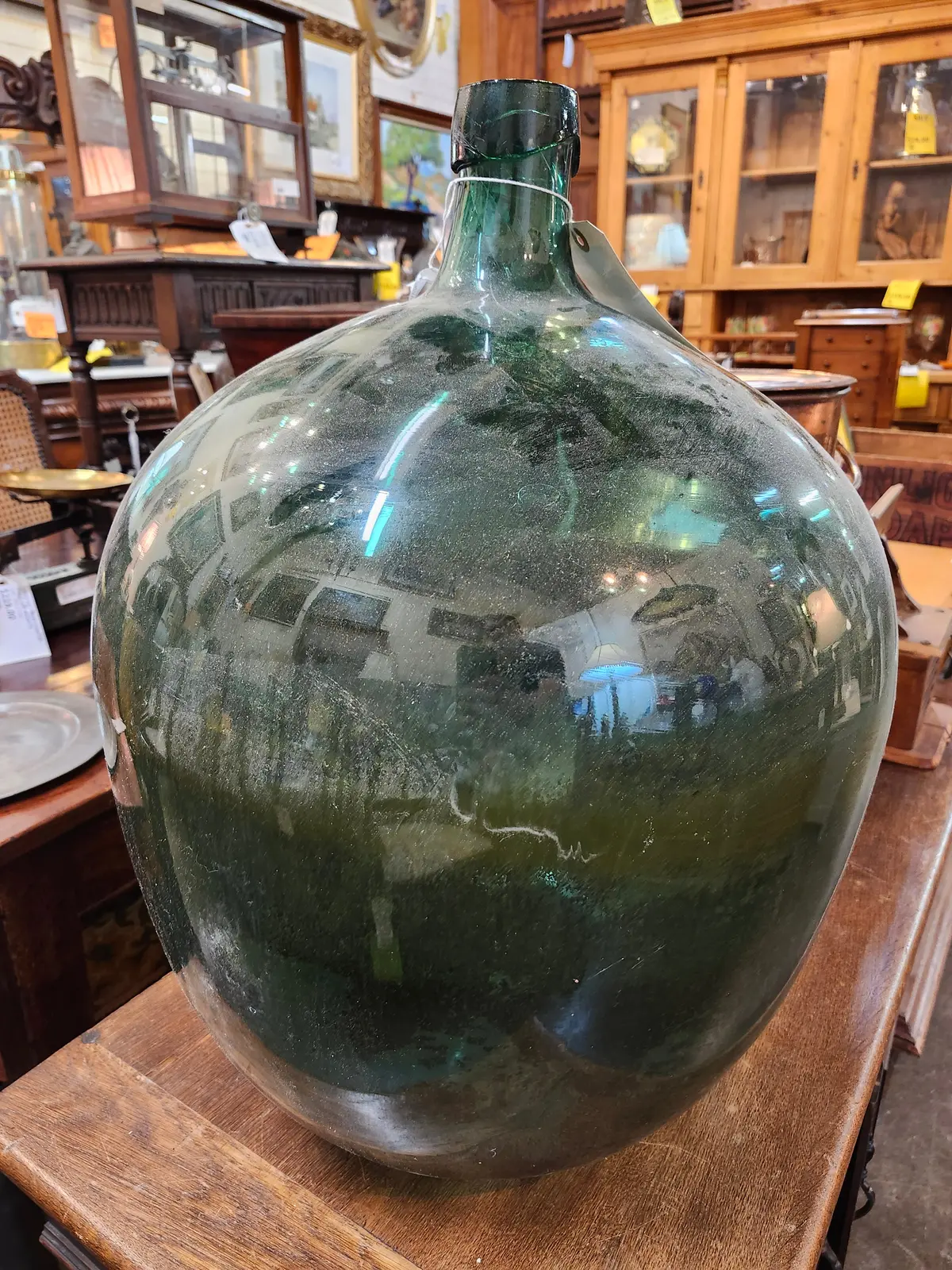 Large Wine Bottle In Basket 1