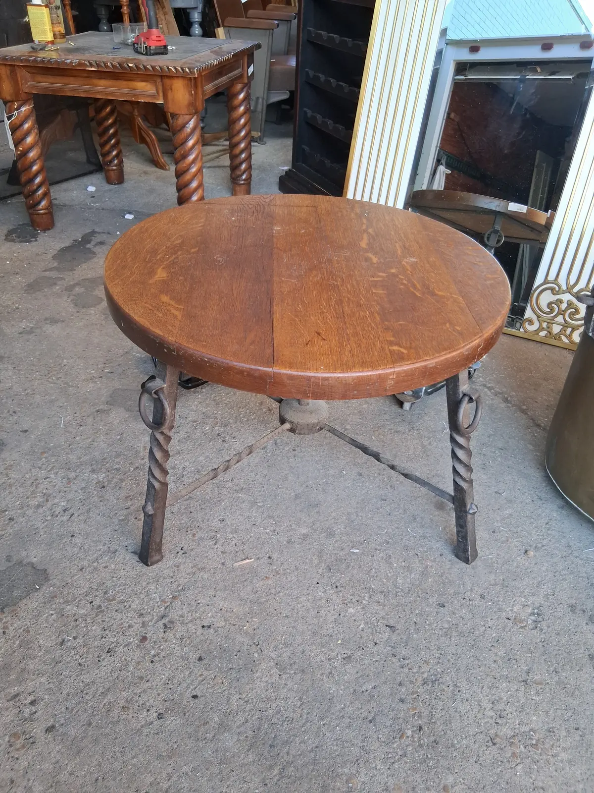 Round Oak Coffee Table With Iron Twist Legs 1